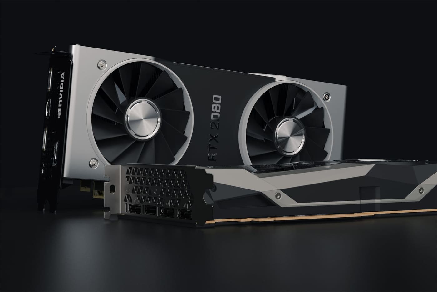 Close up of two NVIDIA RTX graphics cards on a dark surface
